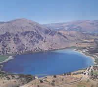 the freshwater lake of Kournas amkes a refreshing swimming hole