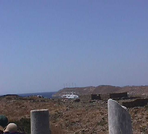 large cruise ship off shore delos