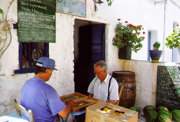 men playing tavli