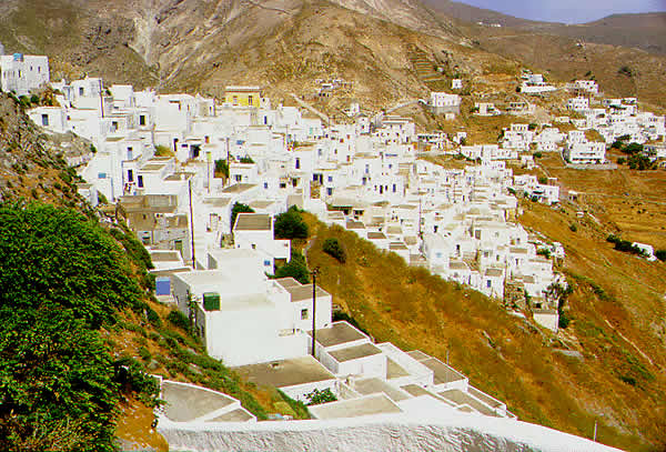 houses cling to the on the mountain slope