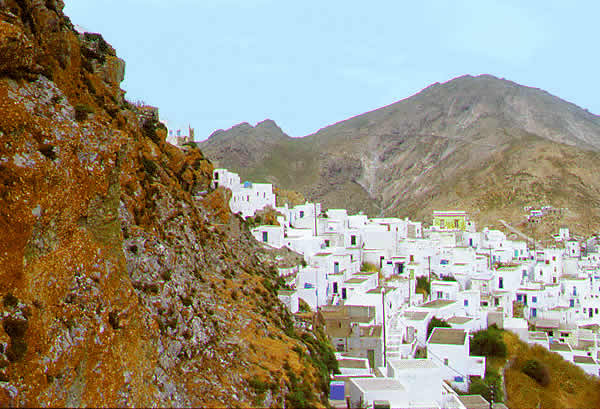 houses cling to the on the mountain slope