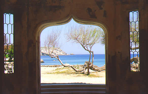 an arch with a sea view