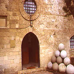 castle view with cannon ball replicas