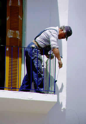 painter on balcony