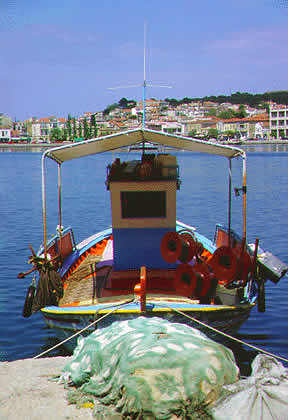 a fishing boat with nets to dry
