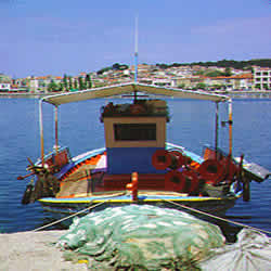 moored fishing boat with nets
